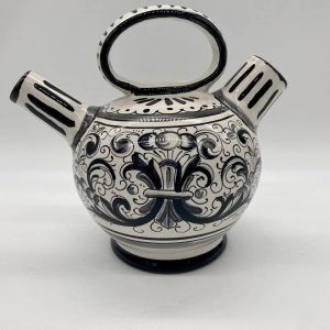 Medieval jug with two classic decorations