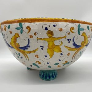 Antique model centerpiece with three legs and handles