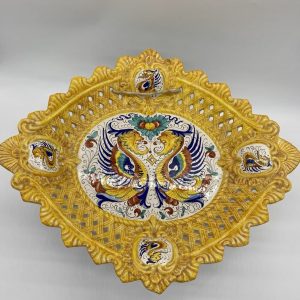 Openwork centerpiece with Raffaellesco decoration
