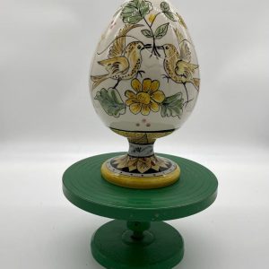 Opening goblet egg with birds in love