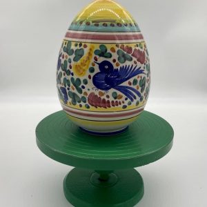 Egg piggy bank with multi-colored Arabesco decoration