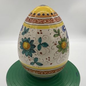 Egg piggy bank with Raffaellesco decoration