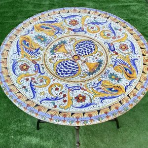 Table complete with iron base with Raffaellesco and Vario decoration diameter 100 cm: available to order