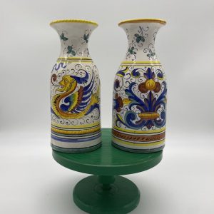 Pair of wine bottles with two classic raffaello decorations